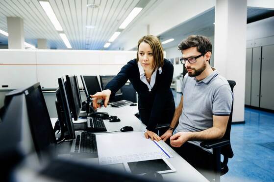 Team reviewing connected business systems
